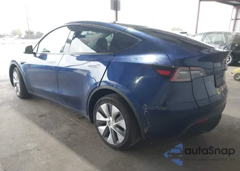 2023 Tesla Model Y Awd/Long Range Dual Motor All-Wheel Drive z USA, uszkodzony, nr VIN 7SAYGAEE9PF873897